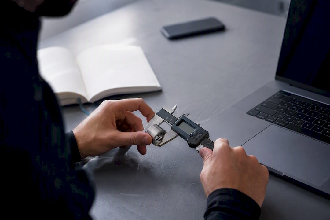 Hands verifying instruments in data validation scene
