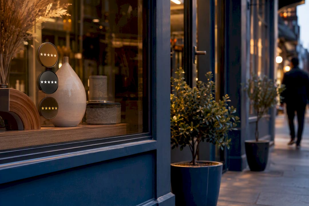 Business storefront with review stickers