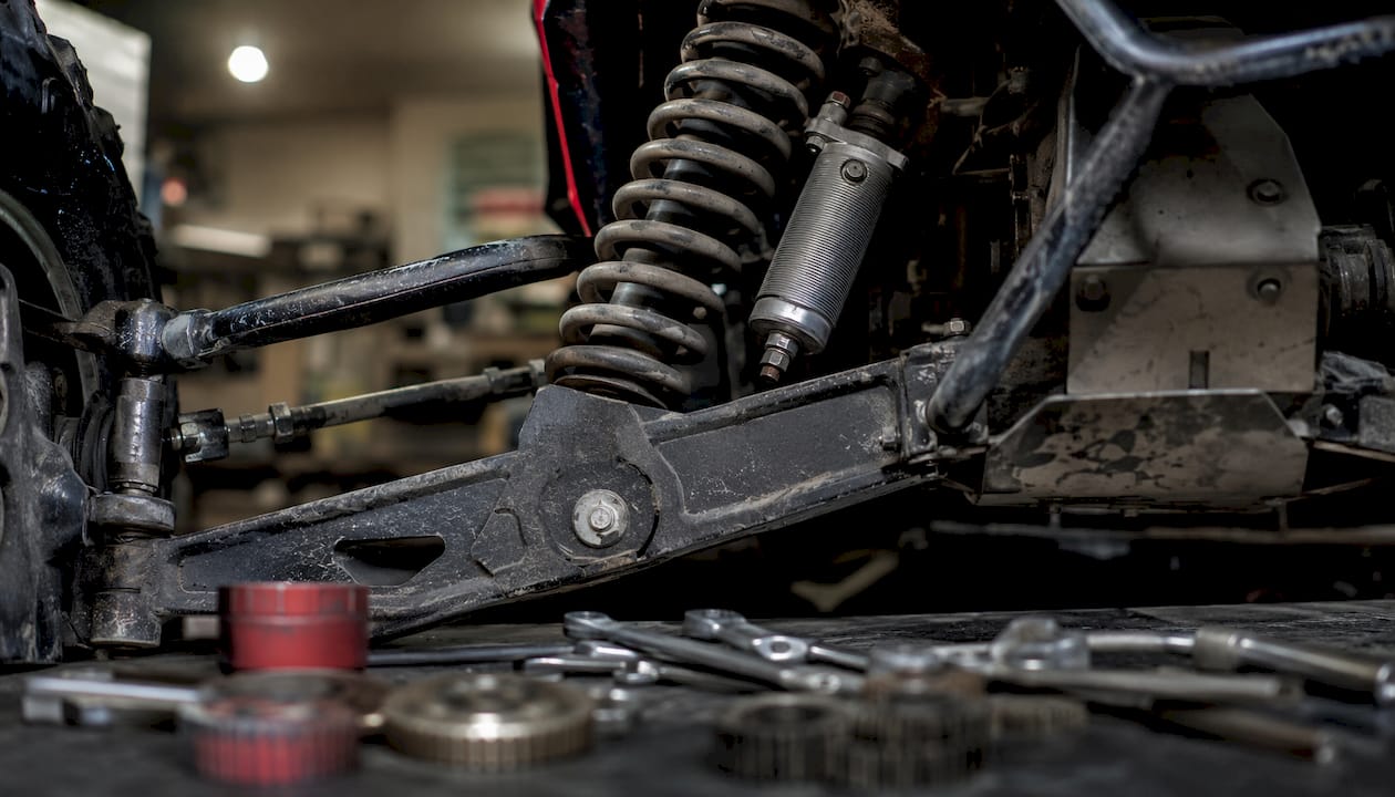 Close-up off-road suspension parts in workshop