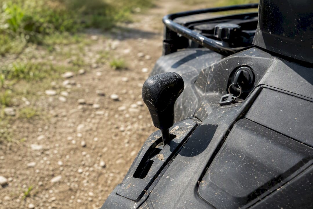 Close-up of mid-range ATV controls on trail