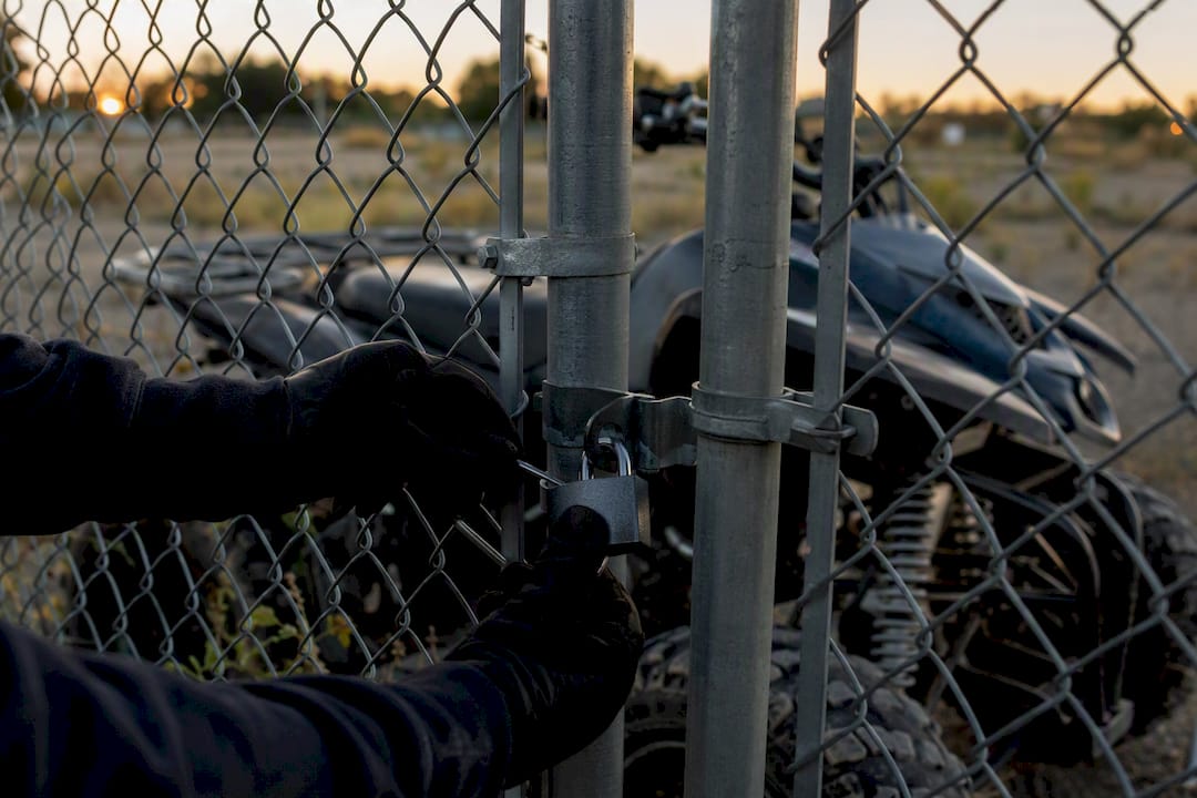 Hands locking ATV impound gate