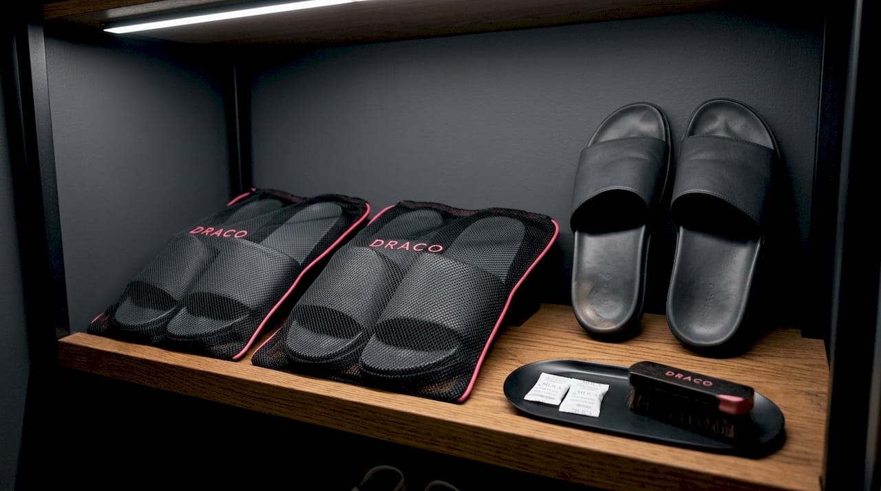 Slide sandals stored neatly in closet