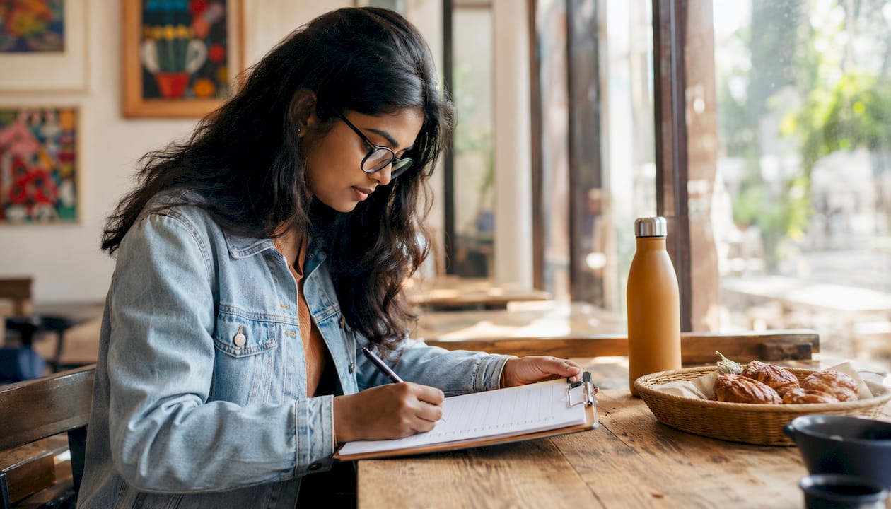 Woman reviewing social media compliance documents