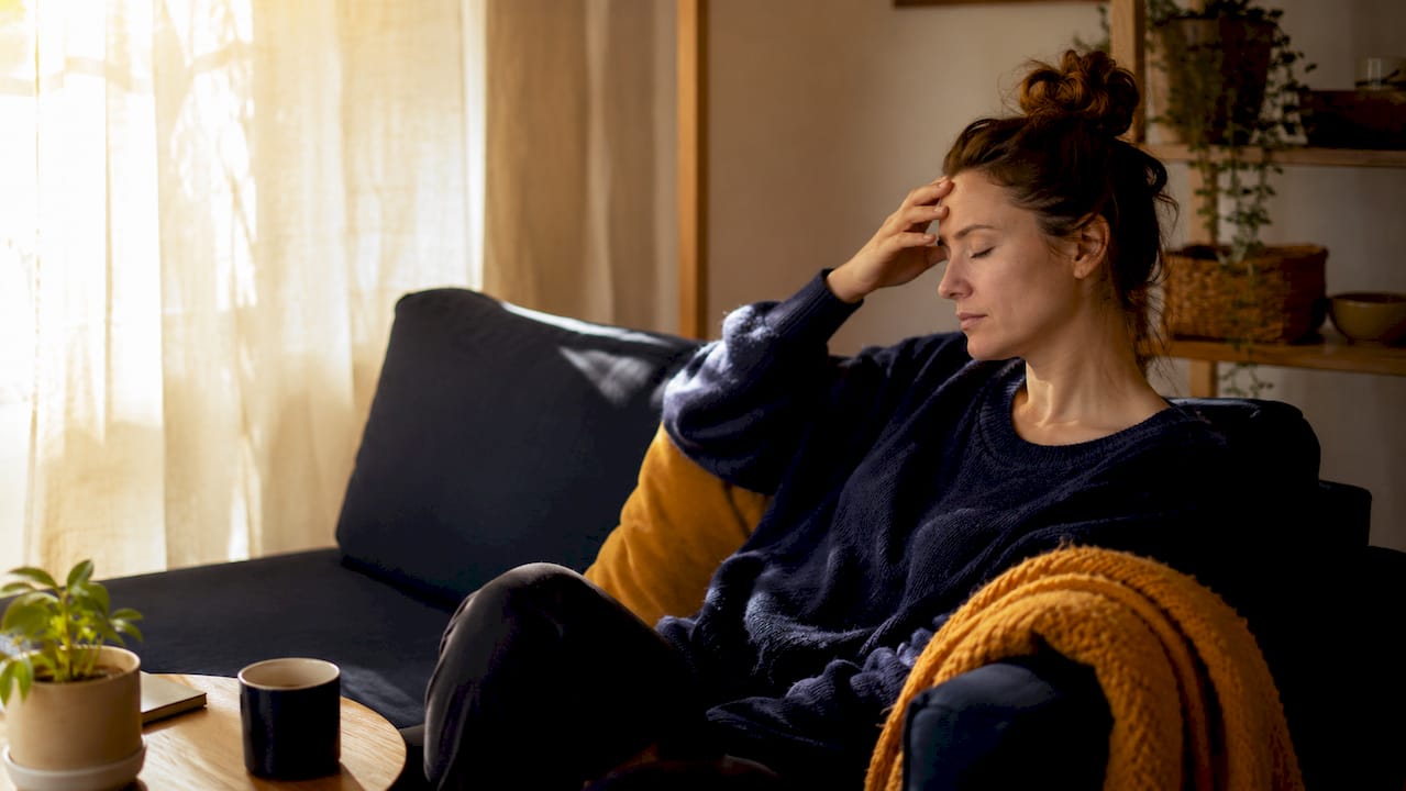 Man practicing emotional regulation at home desk