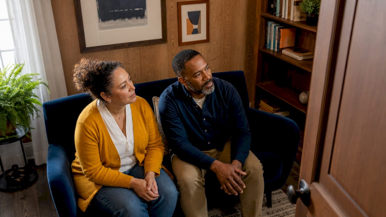 Couple attentively listening during counseling session