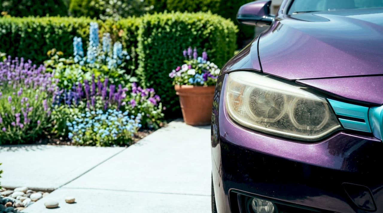 Close-up of oxidized yellow car headlight lens