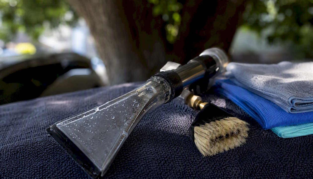 Close-up of car upholstery cleaning tools