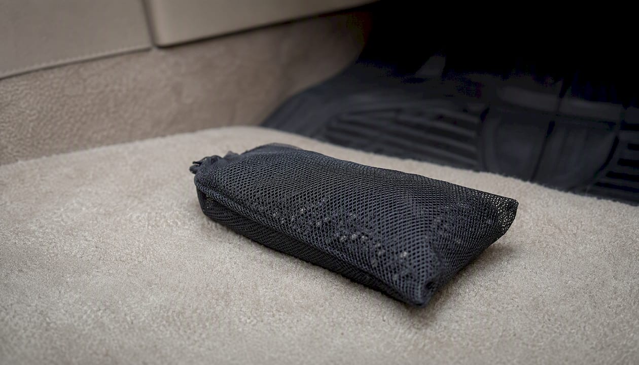 Activated carbon pouch on car carpet