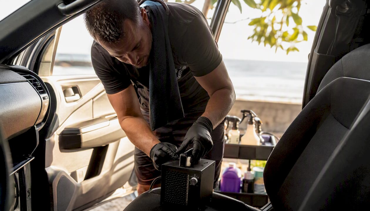 Ozone generator positioned inside vehicle