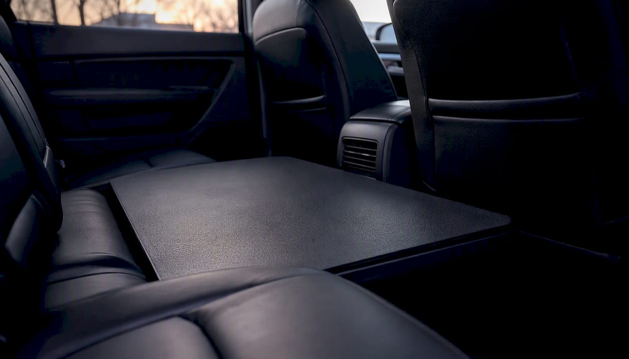 Hard-bottom pet seat extender installed in car