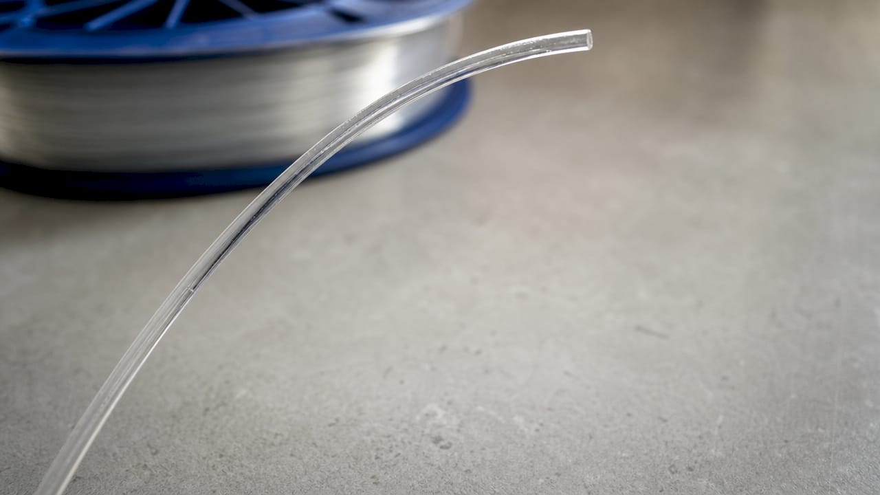 Close-up of thermoplastic filament strand