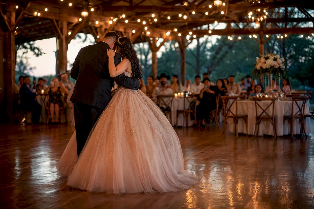 Father and daughter dancing at quinceañera