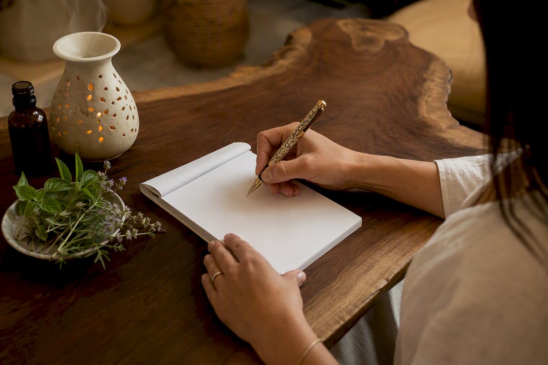 Clinician writing acupuncture referral