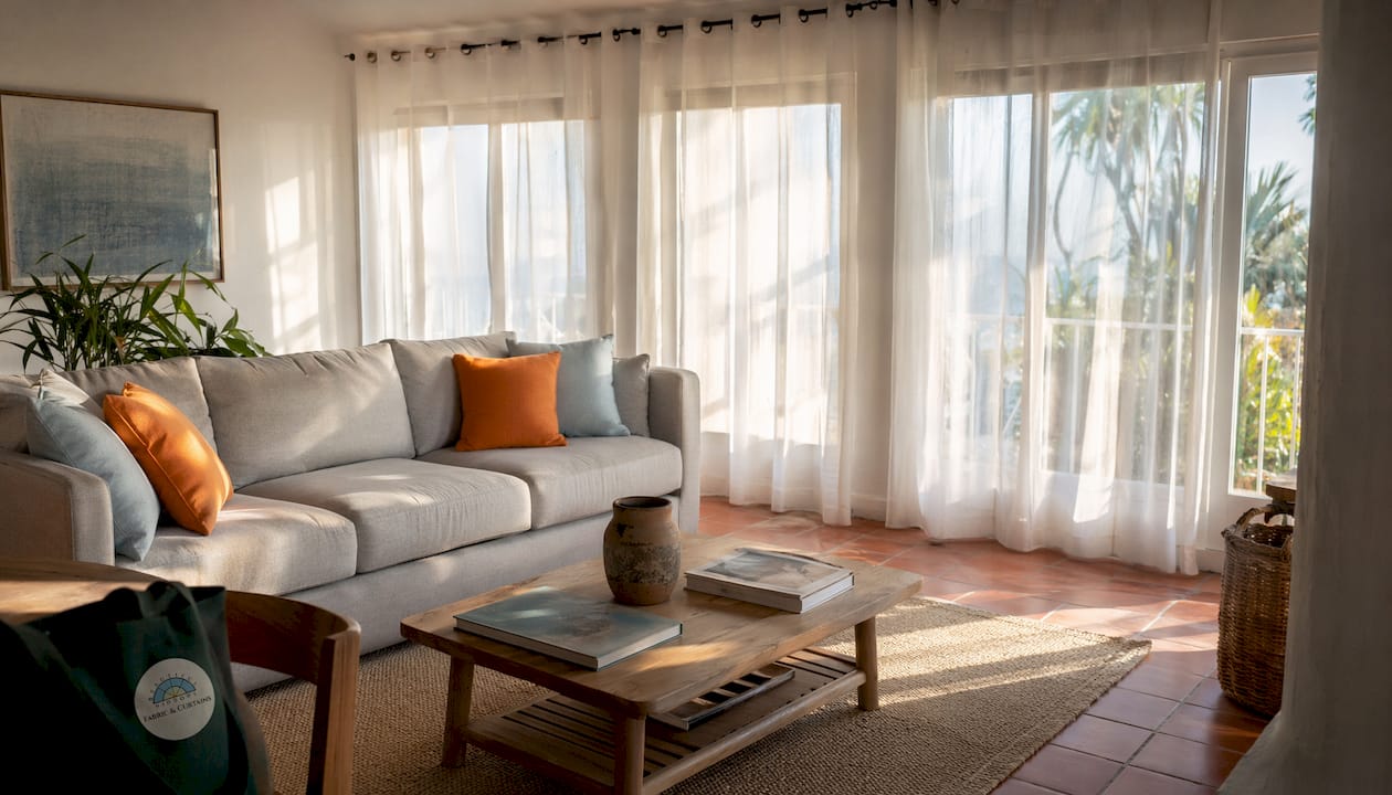 Modern living room with grommet curtains on windows