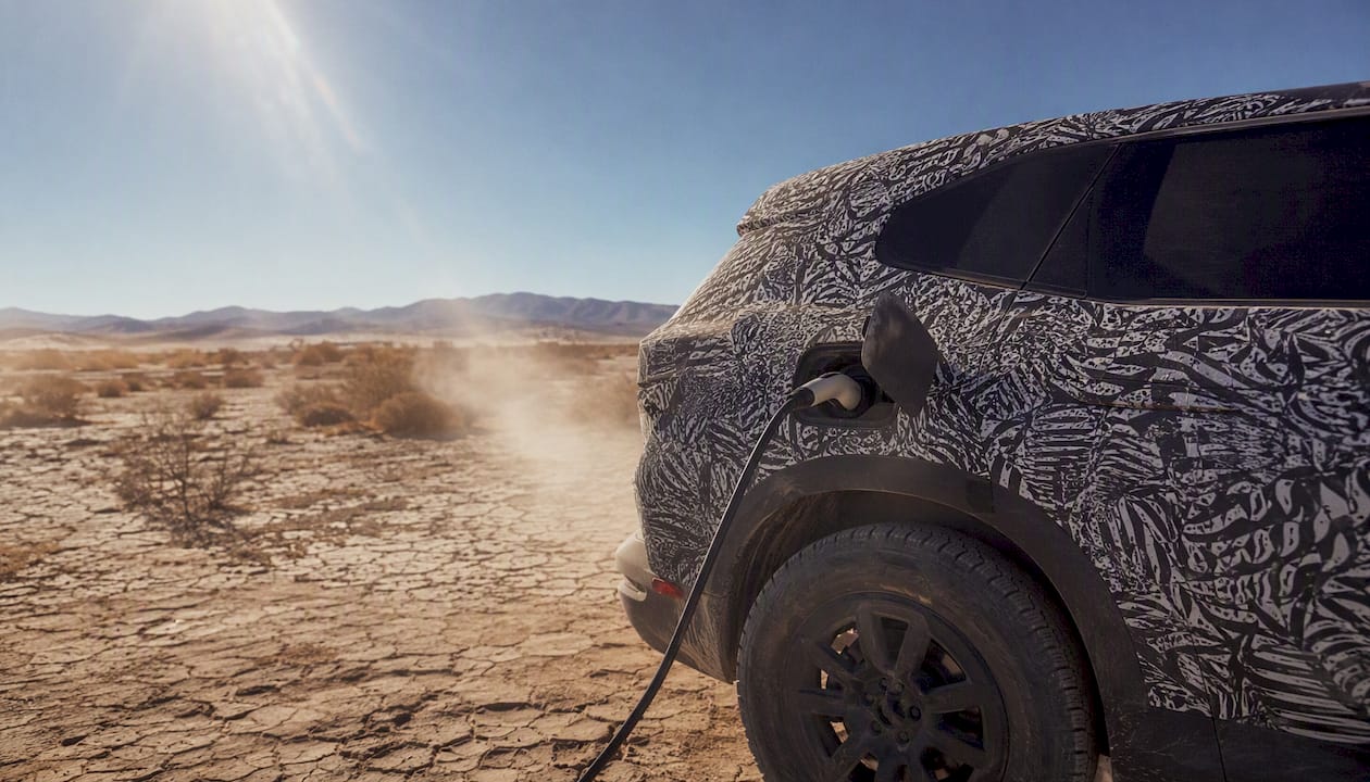 Prototype SUV undergoing heat testing in desert
