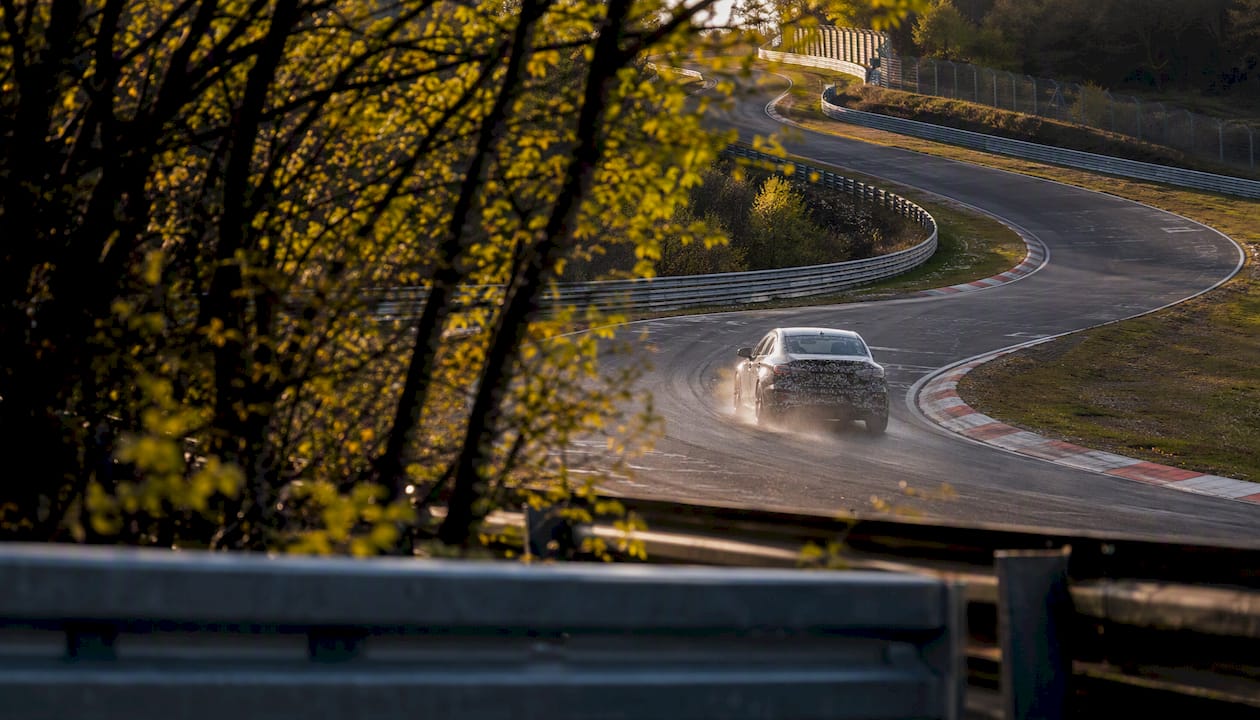 Camouflaged prototype car testing at Nürburgring track