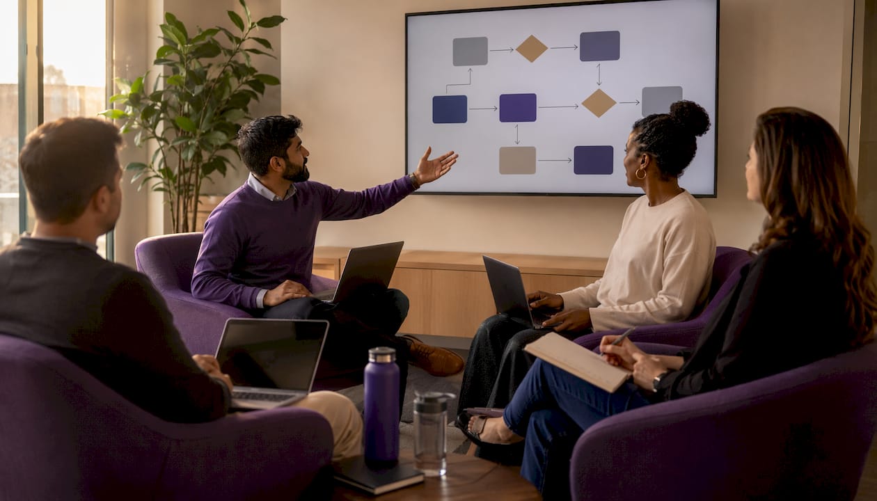 AP team discussing automation workflow in conference room