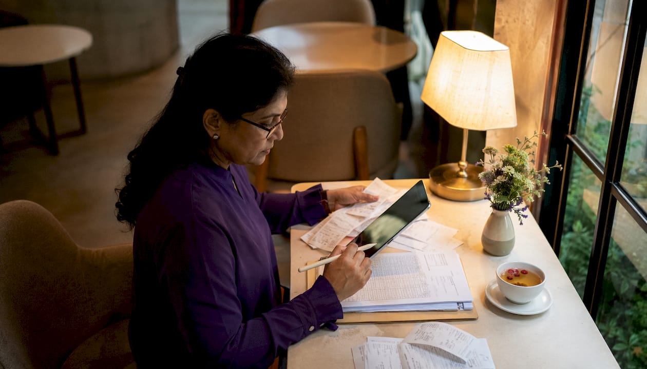 Accountant capturing receipts for expense software