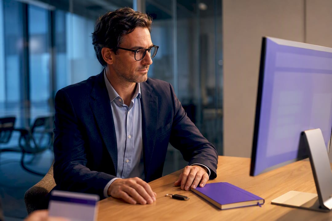 Finance lead reviewing secure bank transaction data