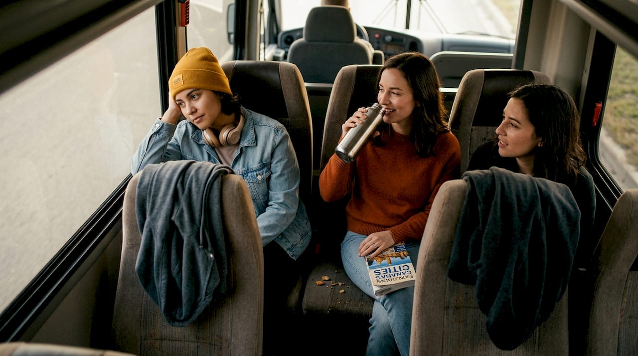 Travelers relaxing comfortably on group bus ride