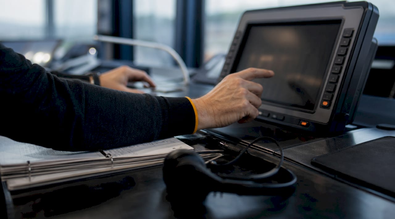 Hands managing corporate transport fleet system