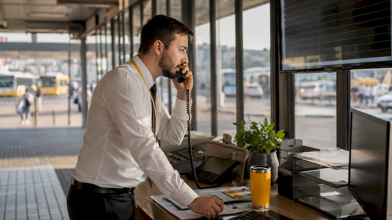 Bus dispatcher coordinating local routes