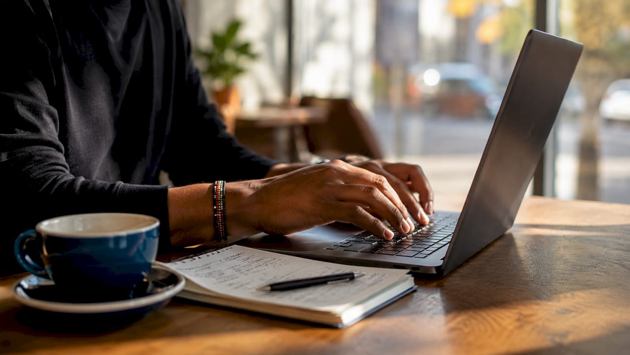 Engineer typing on keyboard integrating delivery API