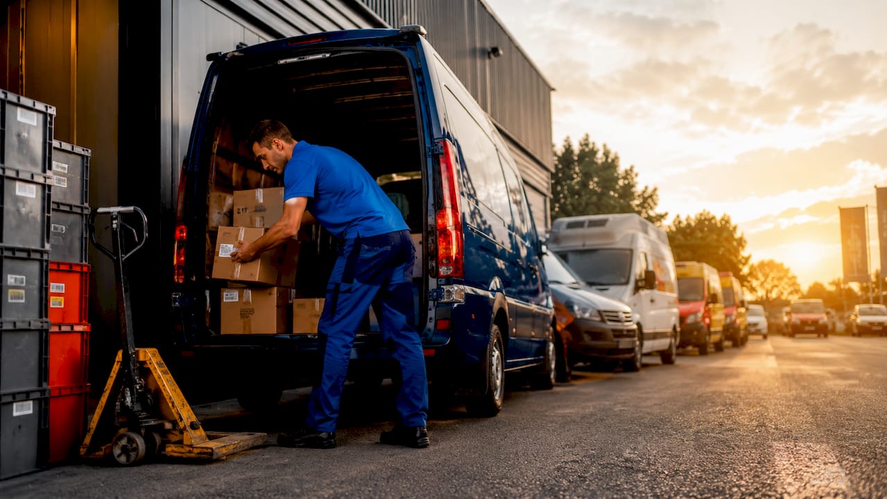 Courier loading delivery van at Bournemouth hub