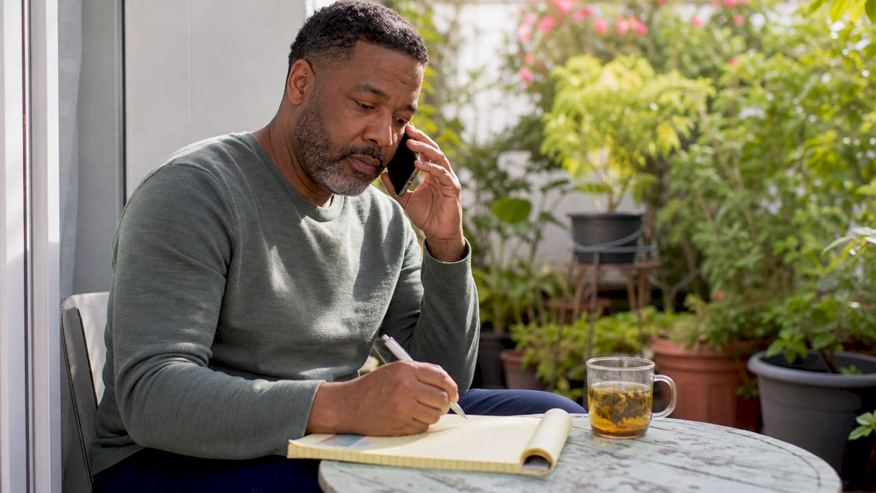 Father on phone arranging therapy support