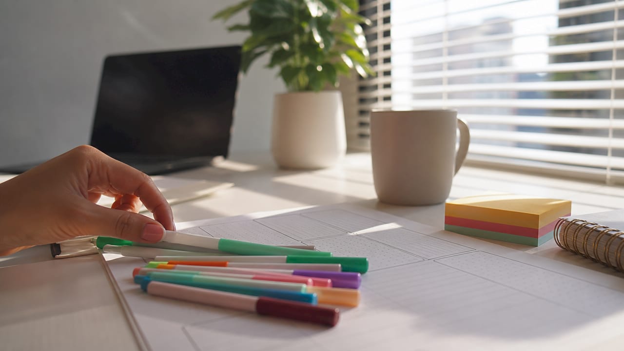 Close-up of journaling tools on desk