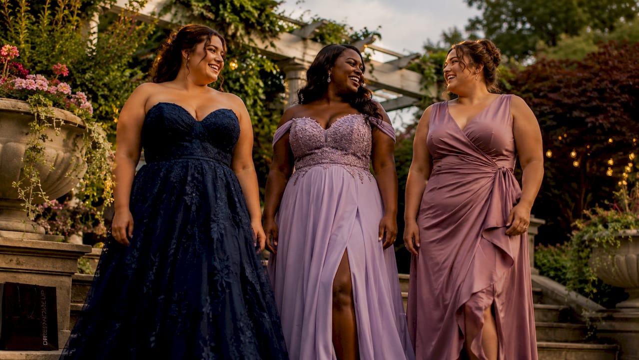 Plus size models wearing different gala dress silhouettes