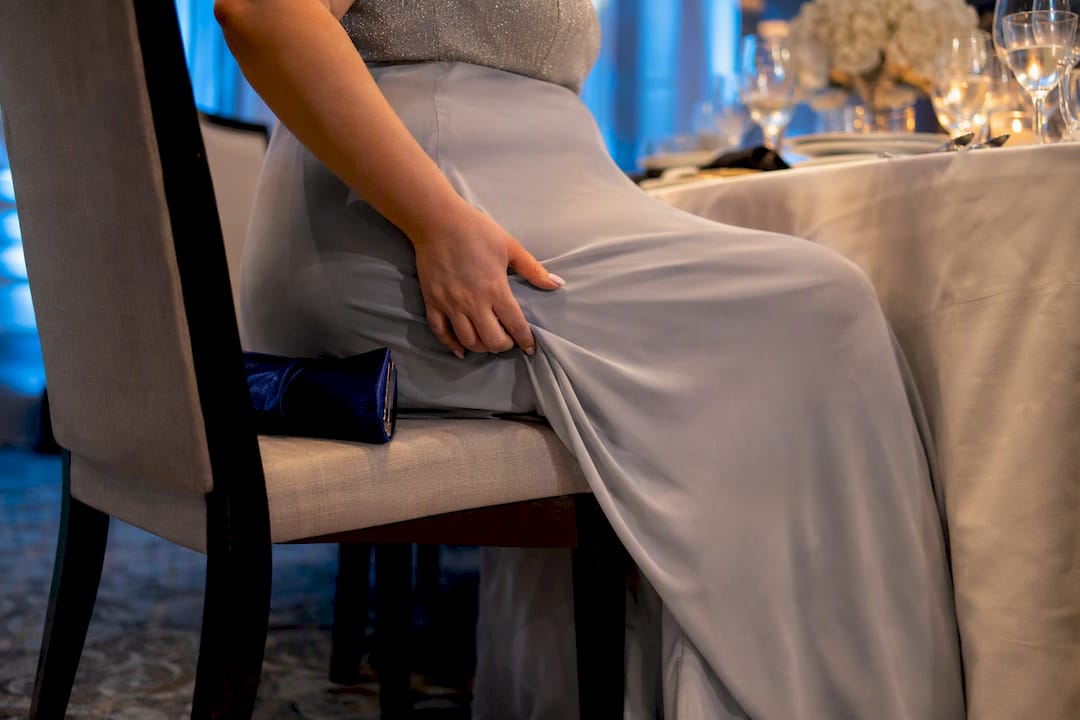 Plus-size attendee testing gown comfort seated