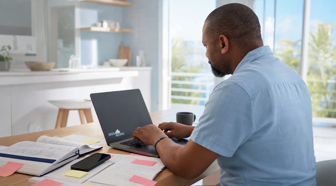 Man creating content strategy at home desk