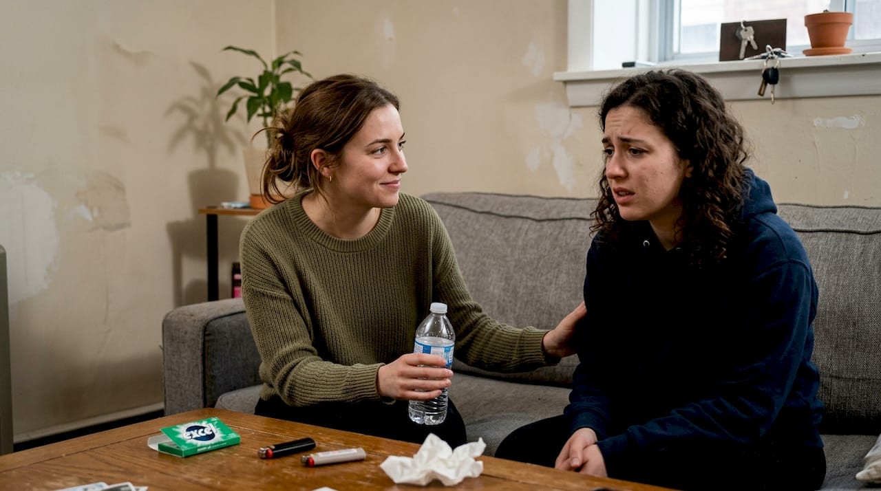 Offering comfort to friend at cannabis session
