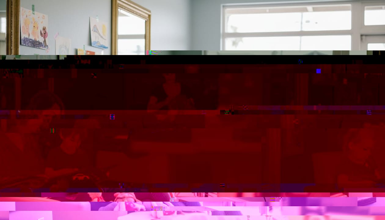 Stylist reassures child during salon haircut