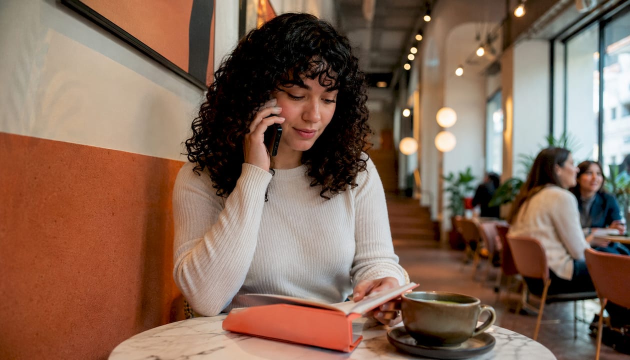 Woman calling salon to confirm appointment