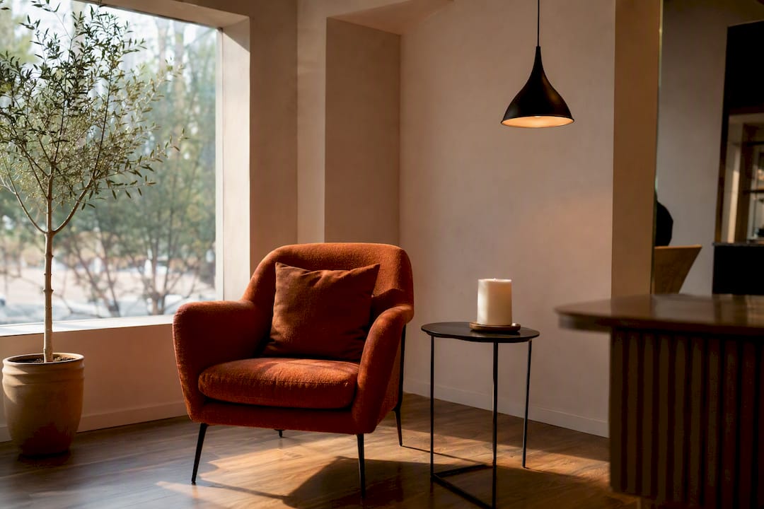 Luxury salon seating with natural light and warm decor