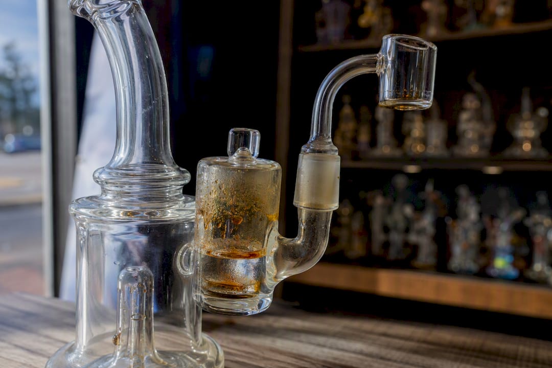 Close-up of dab rig with angled reclaim catcher