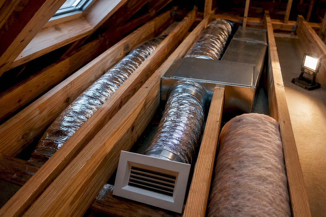 Duct runs navigating tight attic joist spacing