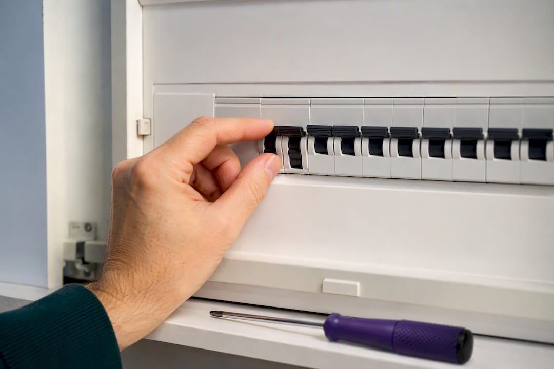 Homeowner resetting auxiliary heat breaker