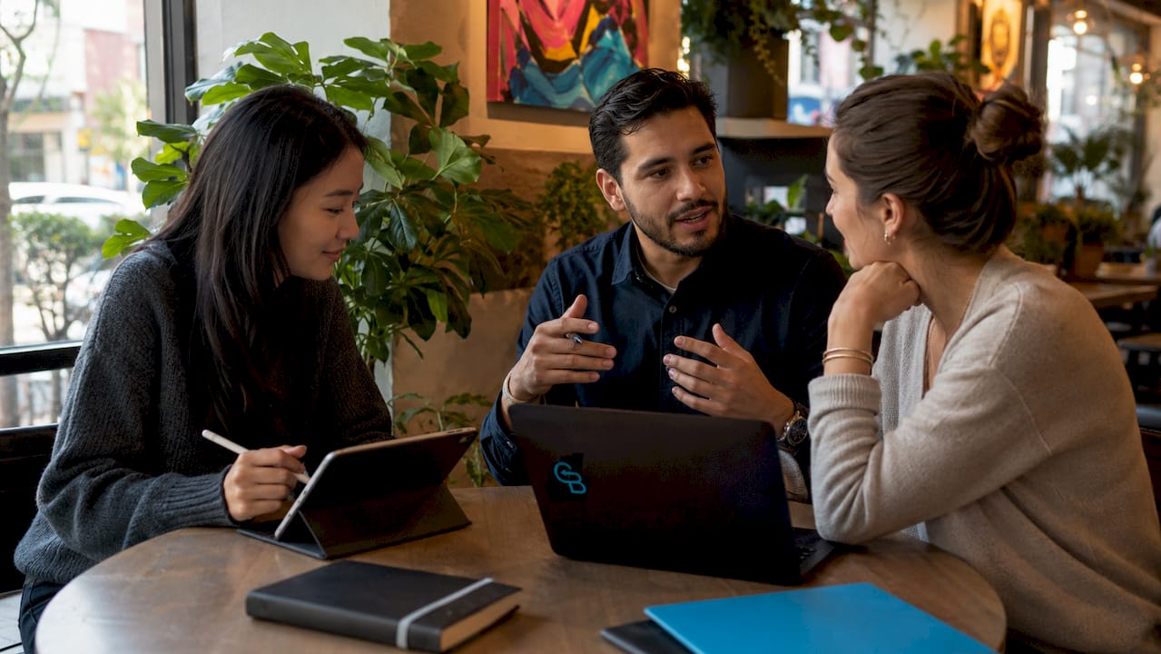 Diverse team collaborating on sales prospecting