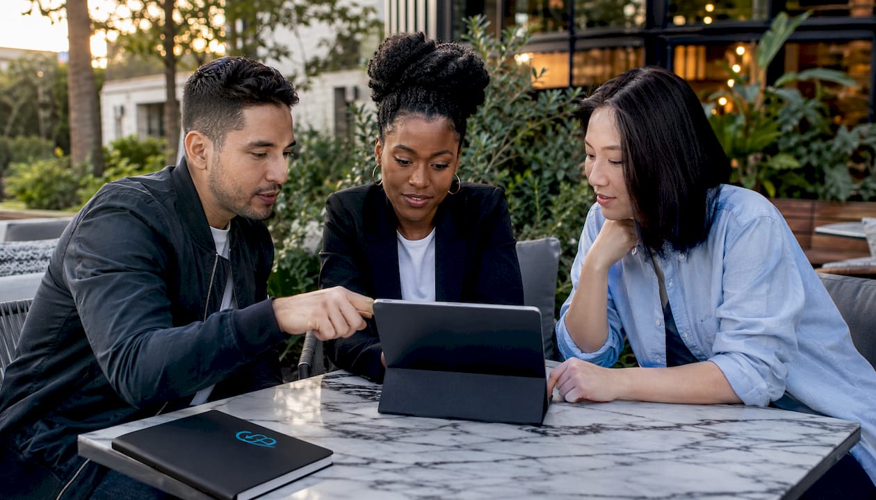 Hands tagging insurance leads on tablet CRM