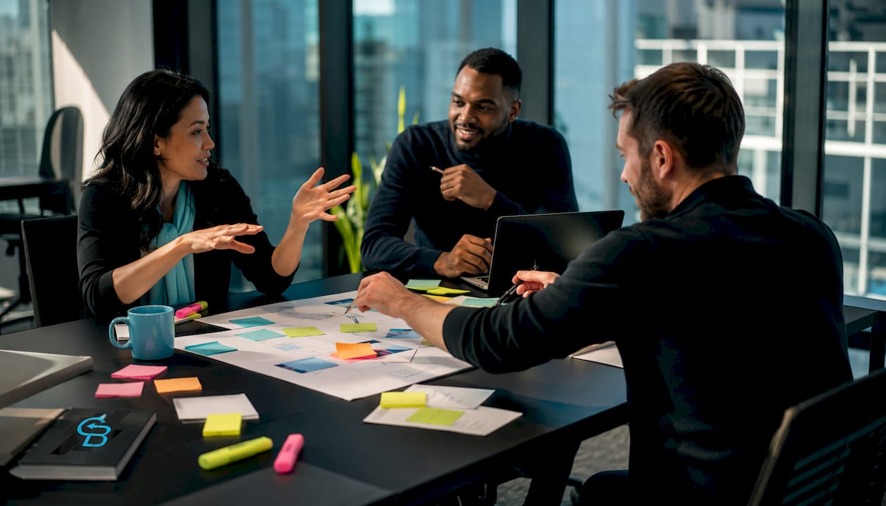 Team discussing customer lifecycle management mistakes