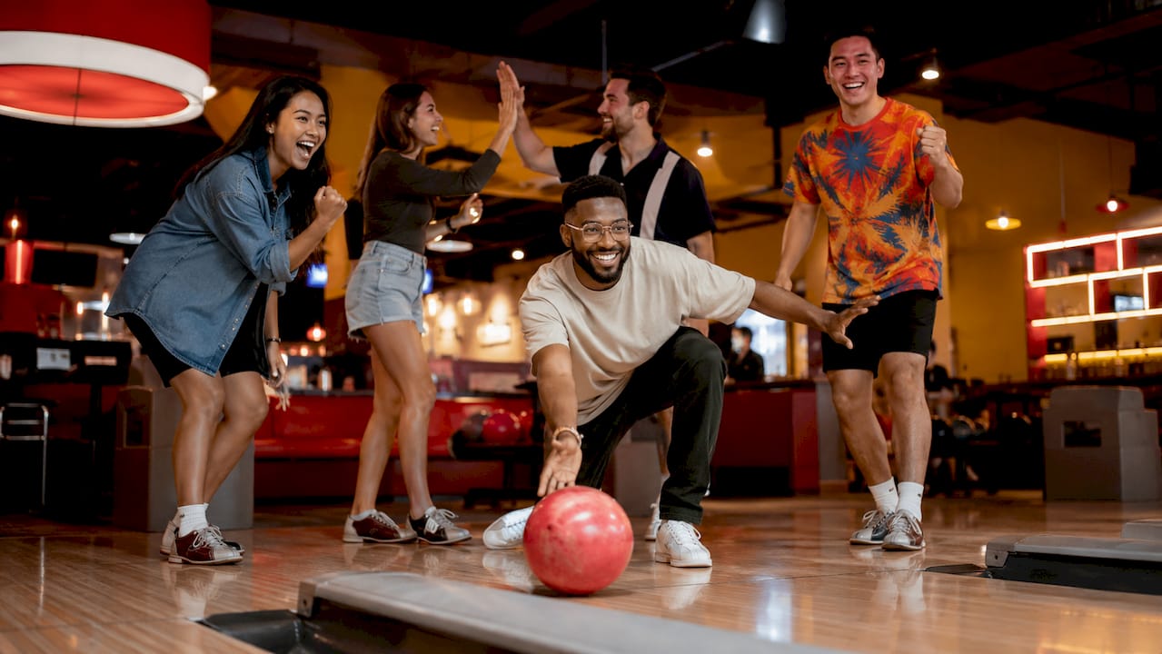 Group of friends enjoying bowling outing