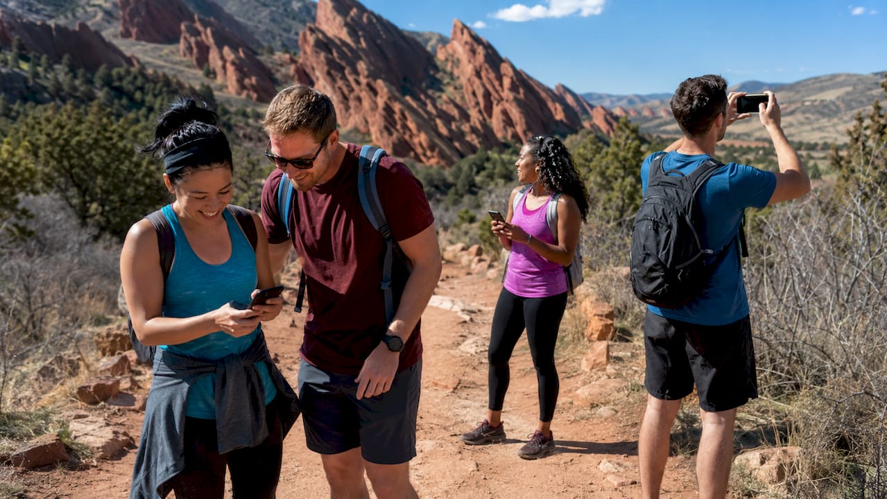 Group outdoors on escape quest near Colorado Springs landmarks