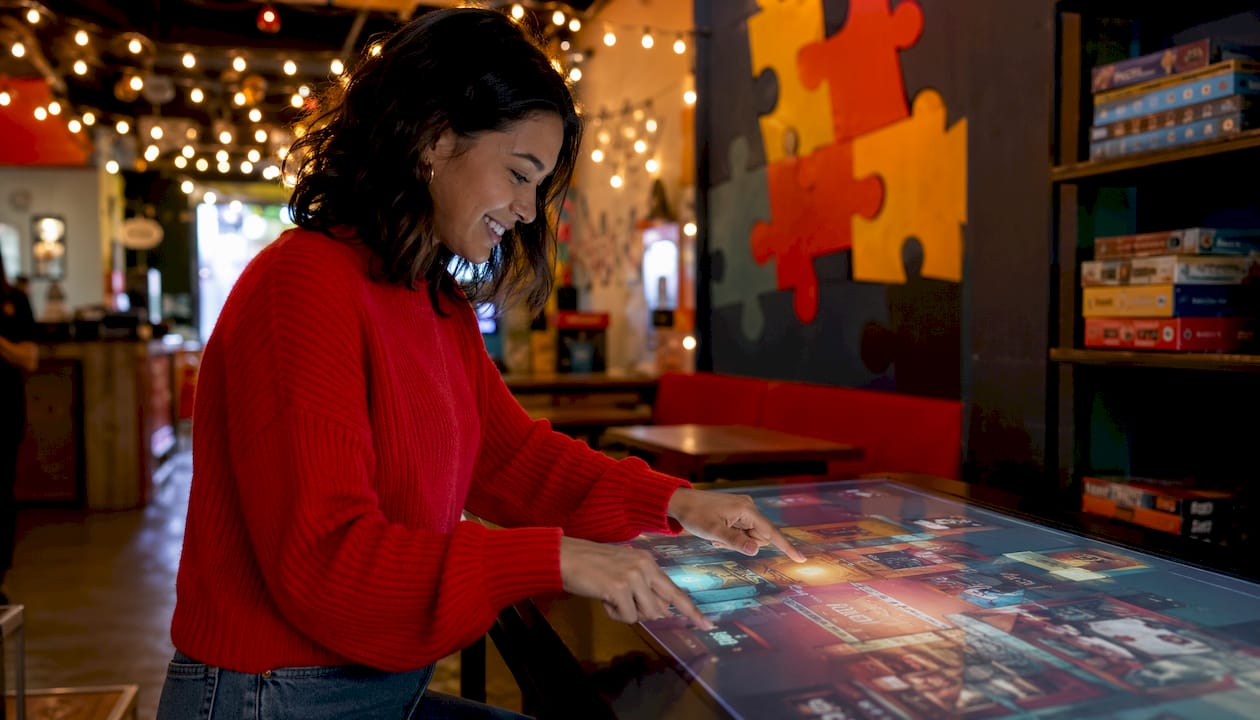 Hands typing in virtual escape room