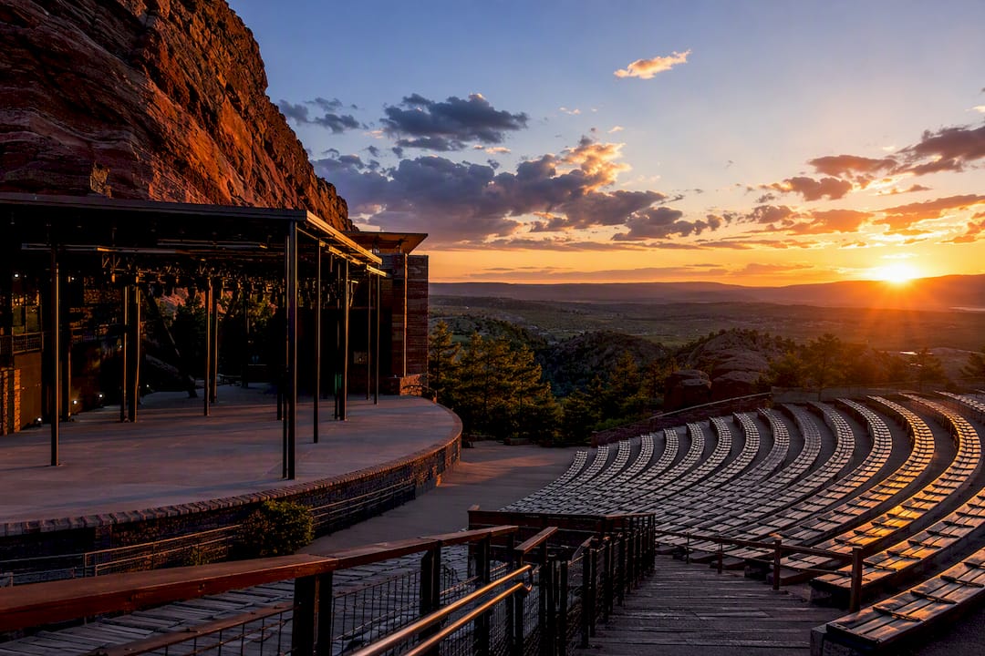 Outdoor amphitheater glowing at sunset