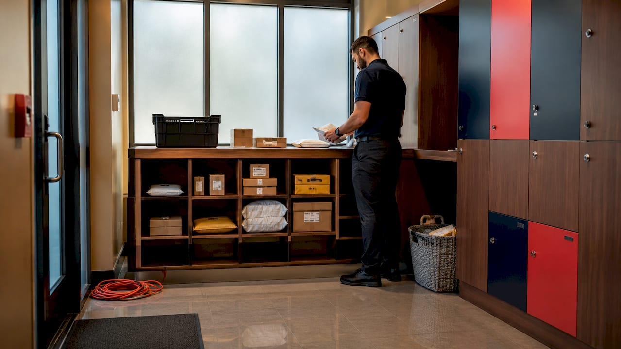 Apartment package receiving room with lockers and logbook