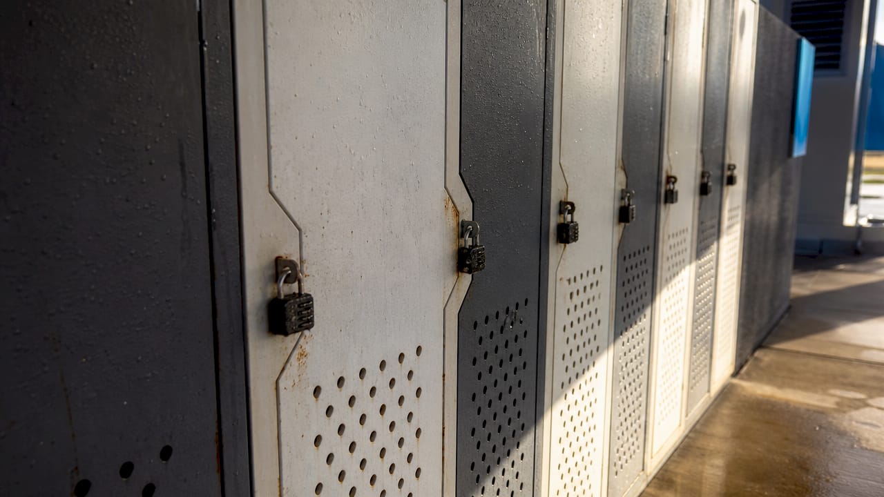 Close-up of outdoor lockers showing rust and moisture effects