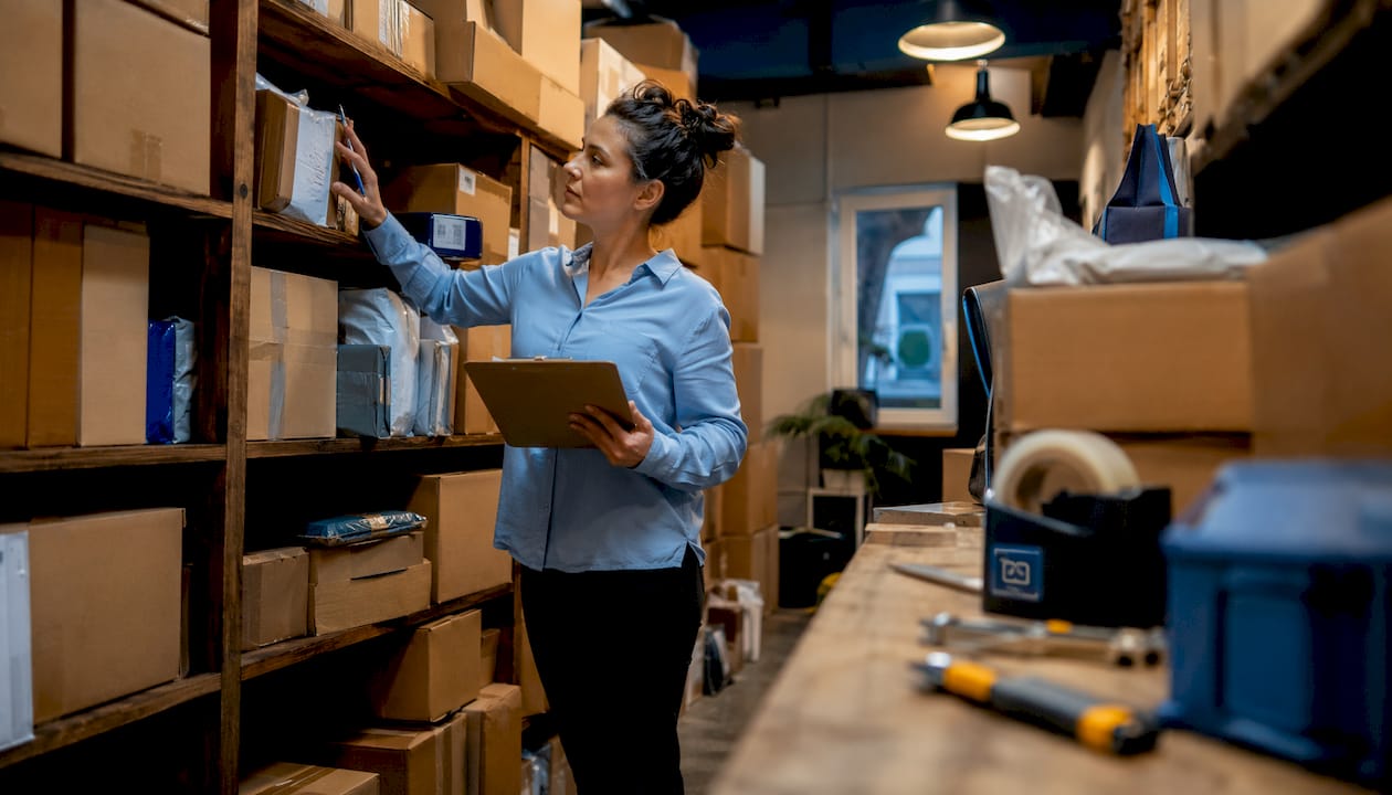 Property manager inspecting package overflow in room
